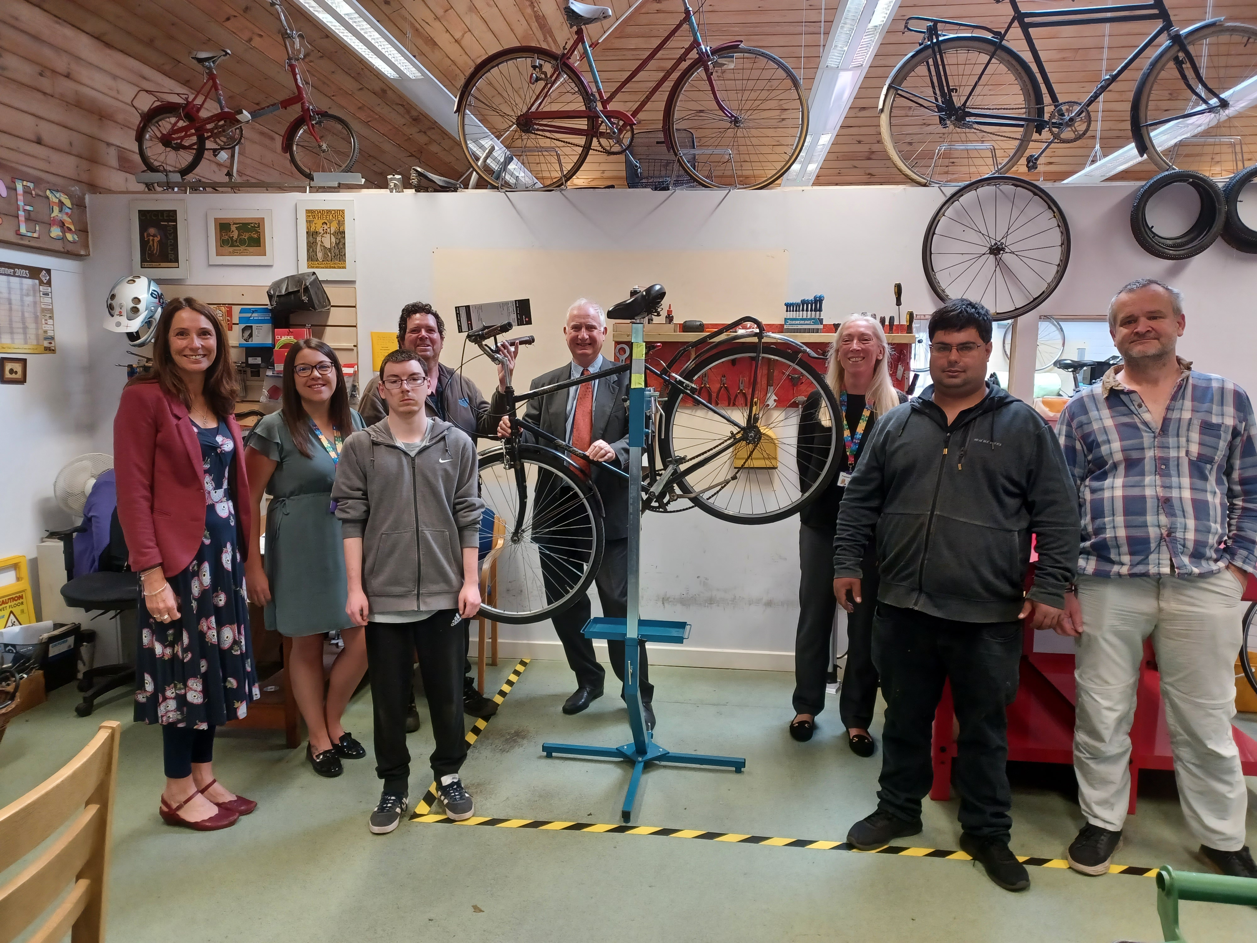 Daniel Zeichner MP pictured with the team from OWL Bikes
