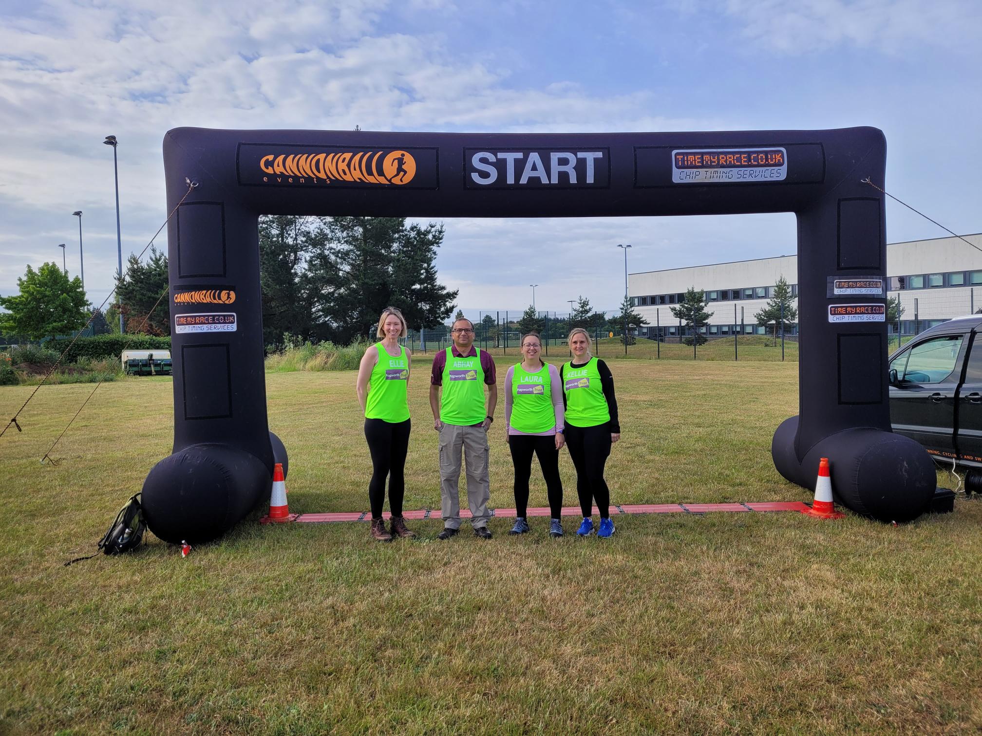 Four people on the Start line of the Orwell Challenge
