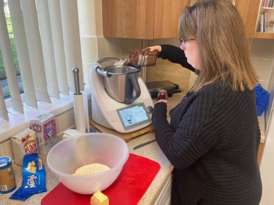 A customer using a Thermomix