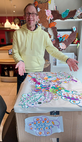 An image of a customer witha drawing