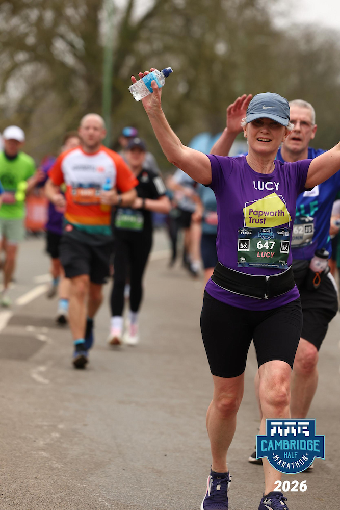 Lucy in Papworth Trust running vest