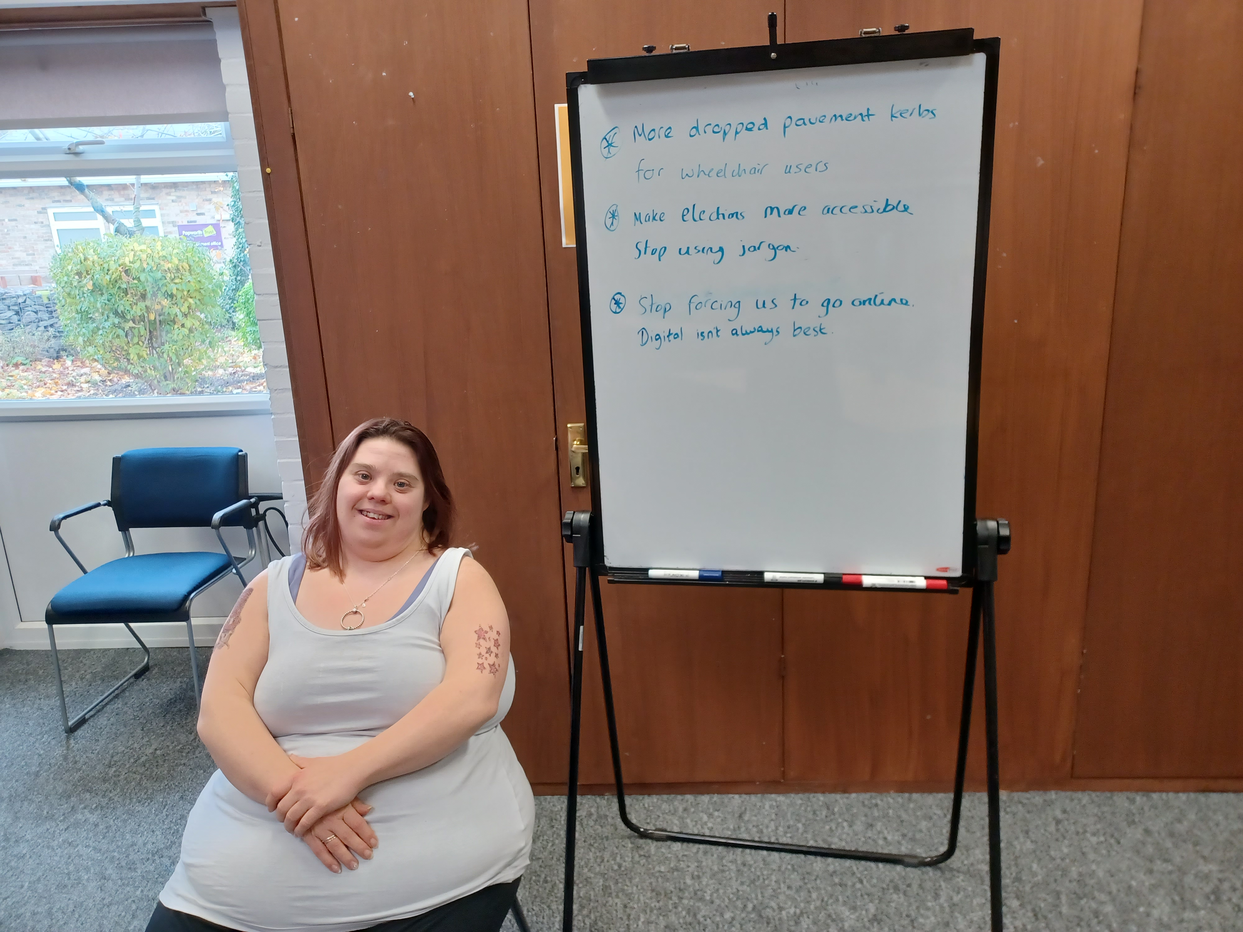 Image of a customer in front of a whiteboard