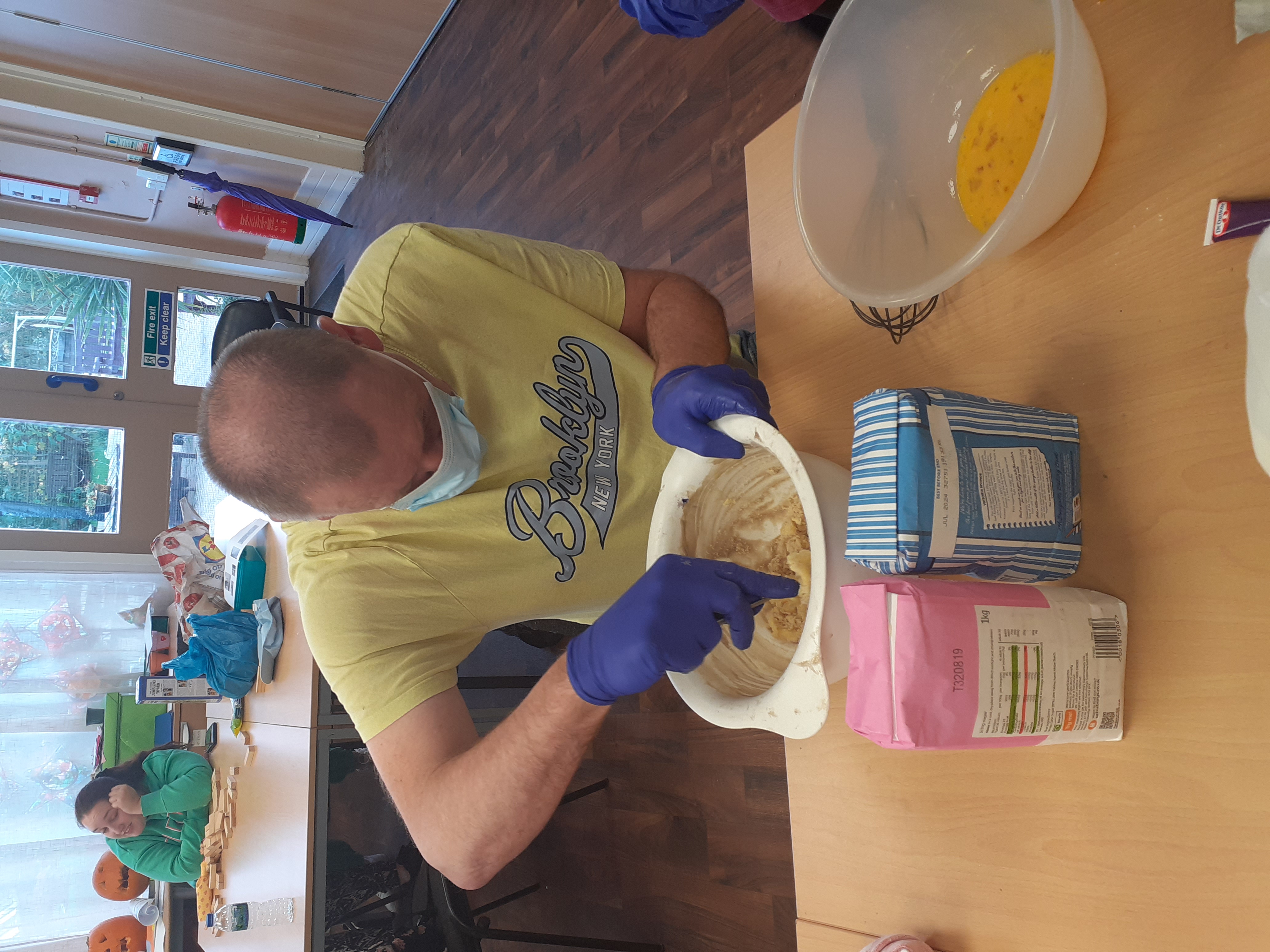 Papworth Trust customer baking a cake