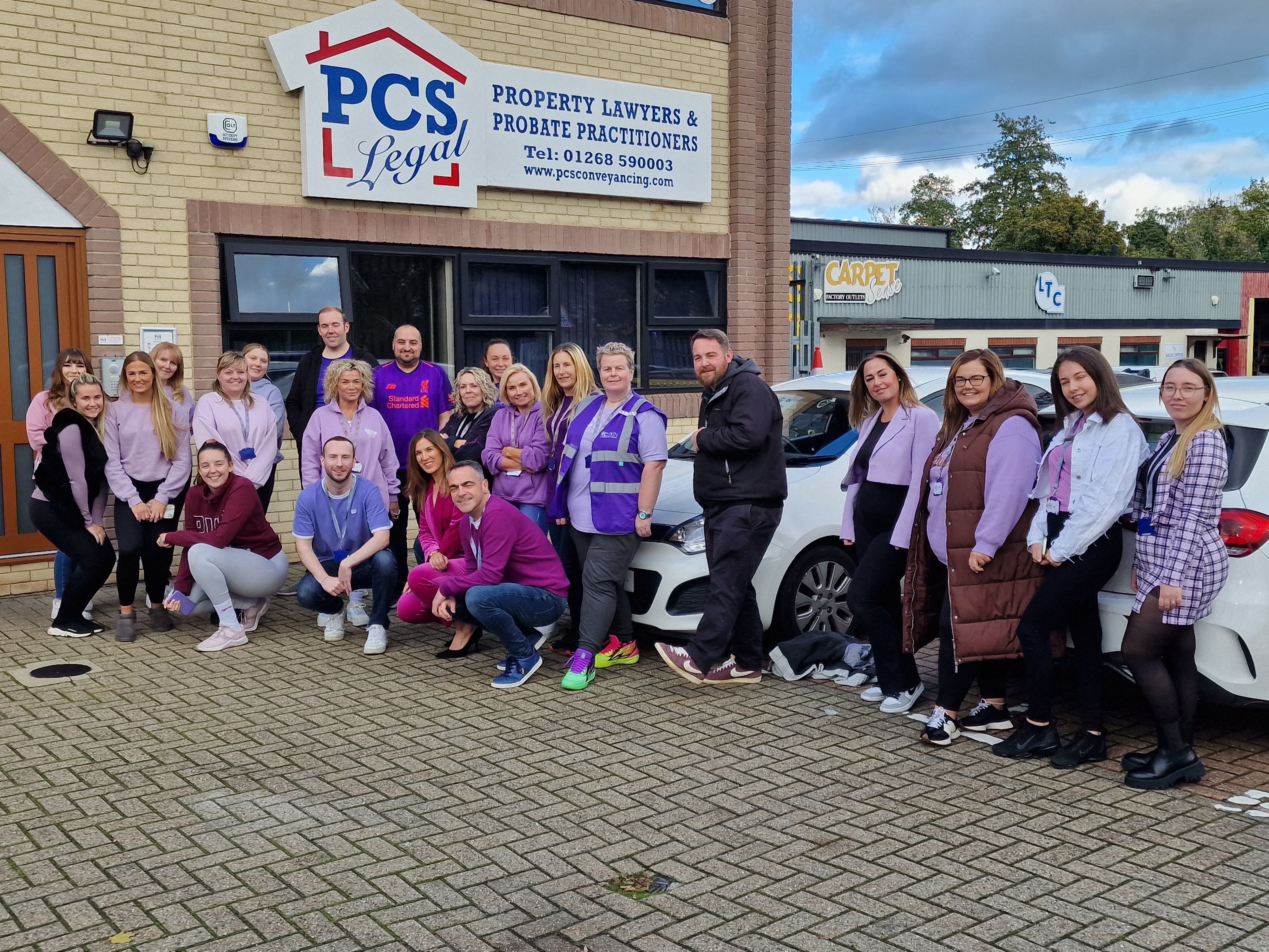 PCS Legal team dressed in Purple