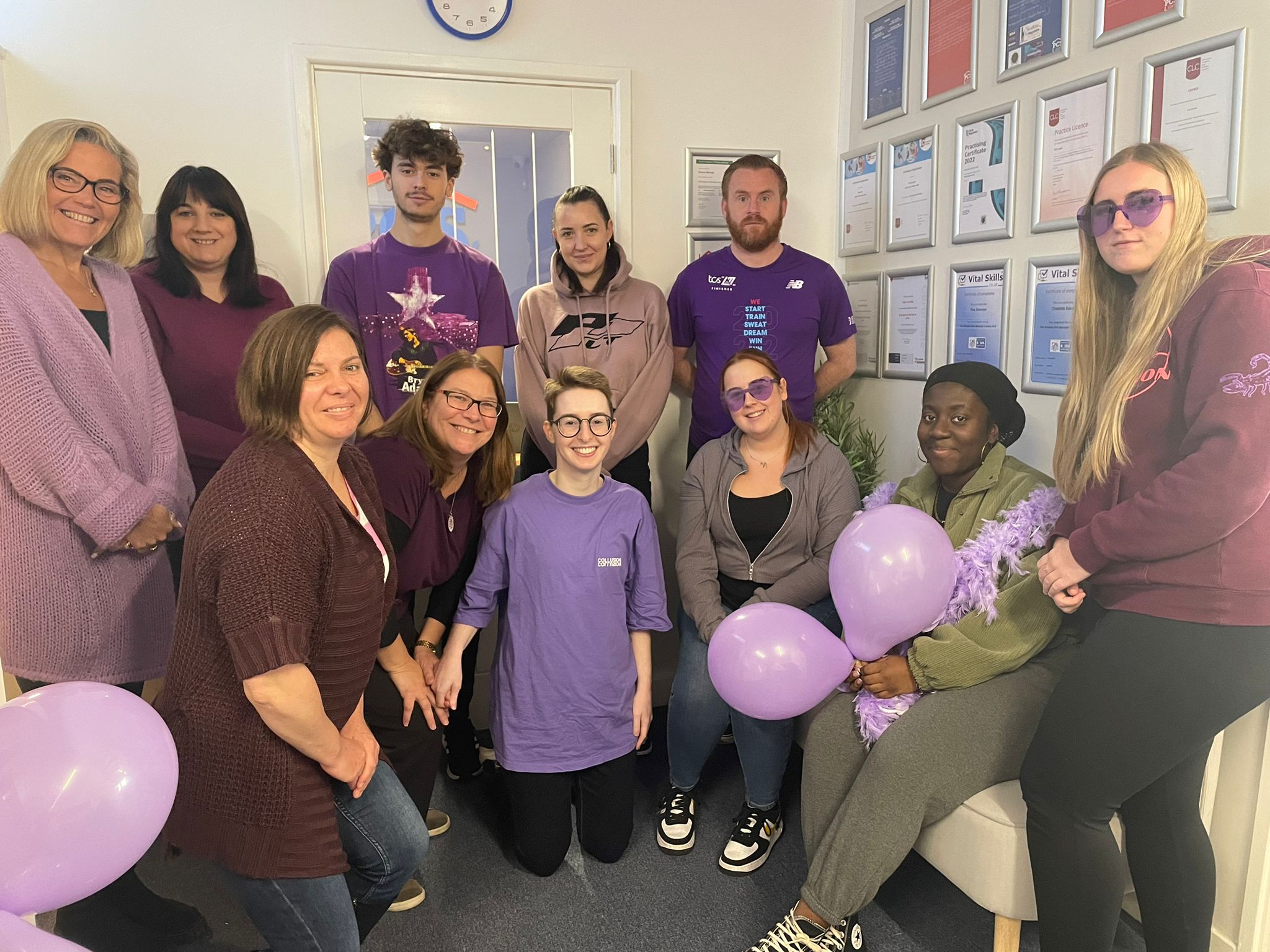 PCS Legal team dressed in Purple