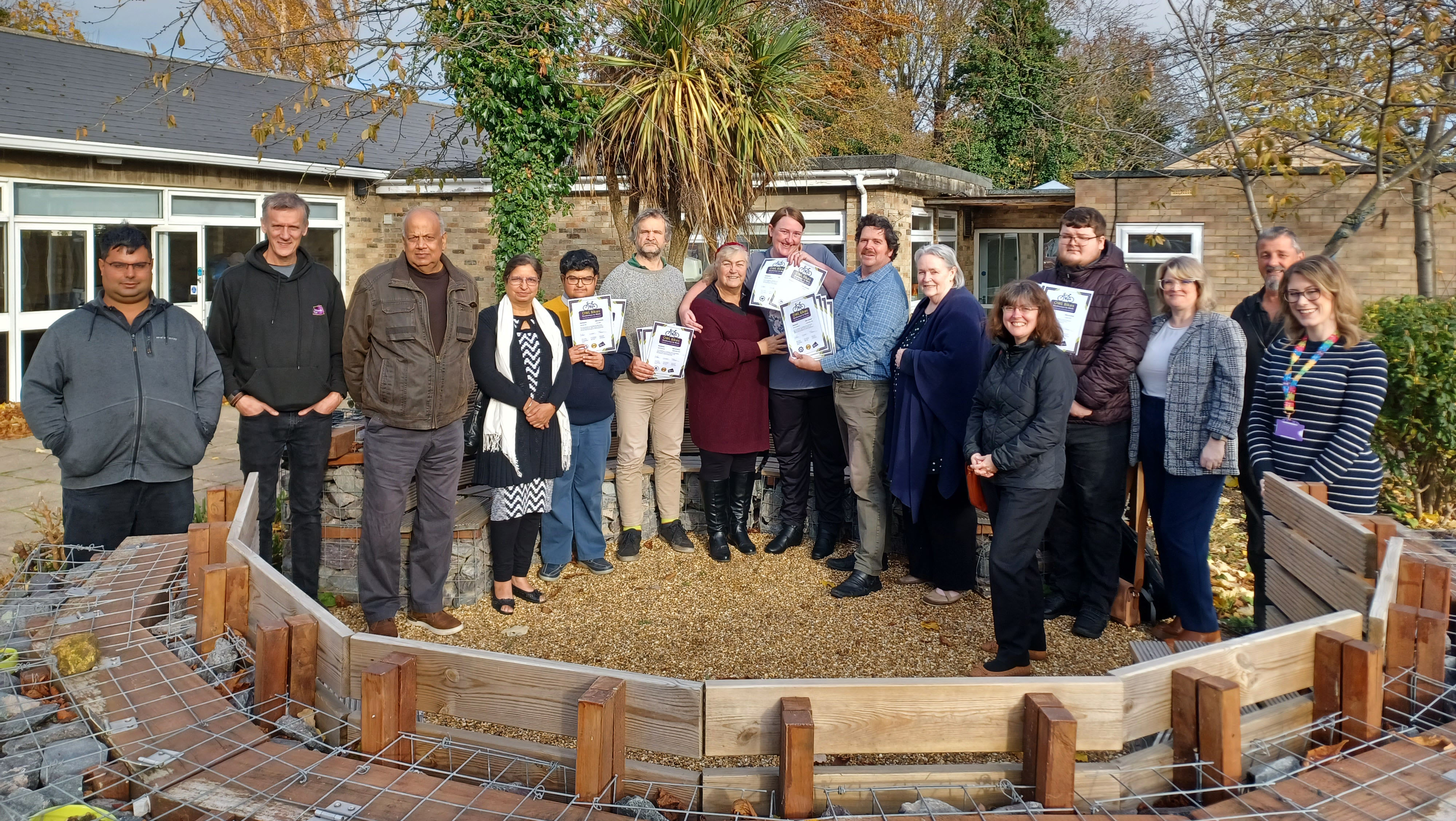 a group photo of staff and customers