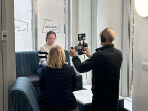 An image of a customer being interviewed