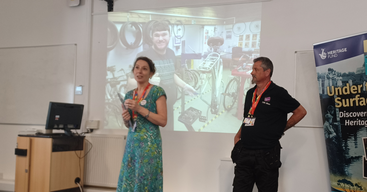 A photo of Fleur and Barry presenting.