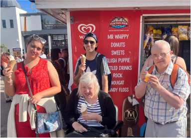 Customers at Clacton eating ice cream