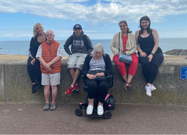 A photo of customers at the beachfront