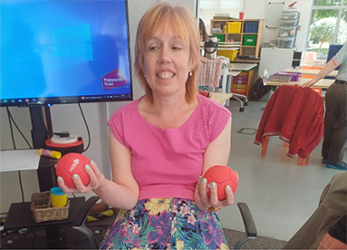 A photo of a customer with Boccia balls