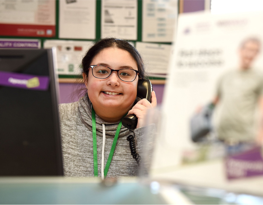 A photo of a person on the phone